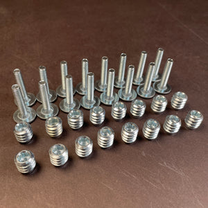 Rampa threaded insert and bolts showing two nice neat rows layed out showing the total of 16 that you get in your purchase. These inserts are M5 size