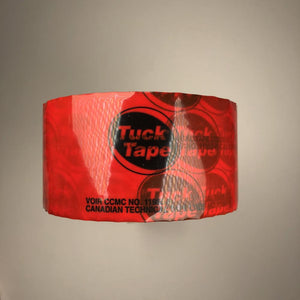 side view of a roll of tuck tape to show the vibrant red colour and the shine of the tape 
